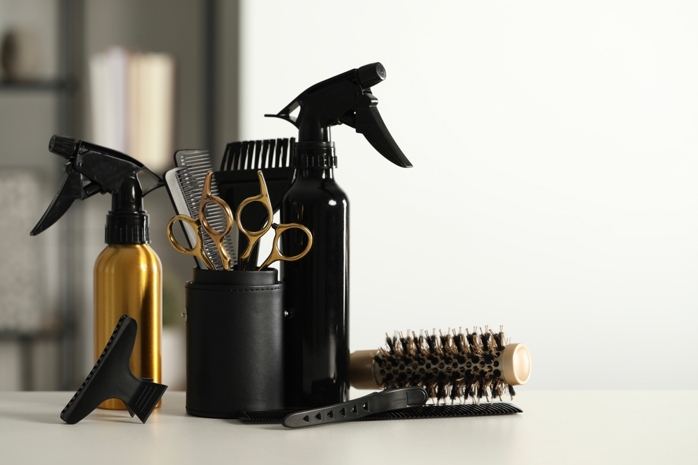 Set,of,hairdresser,tools,on,table,in,salon,,space,for