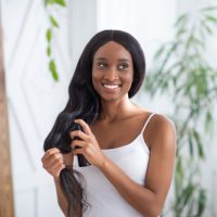 Hair,care,cosmetic.,happy,millennial,african,american,female,apply,hair